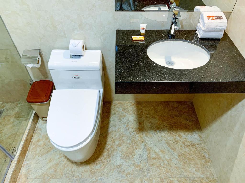 Koupelna v ubytování SM HOTEL Plus