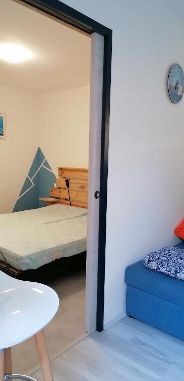 Postel nebo postele na pokoji v ubytování GITE DOUSTRET