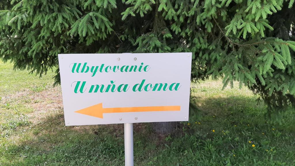 a sign for the university of niumeumeumeumeumeumeumeumeume at U mňa doma in Lučatín