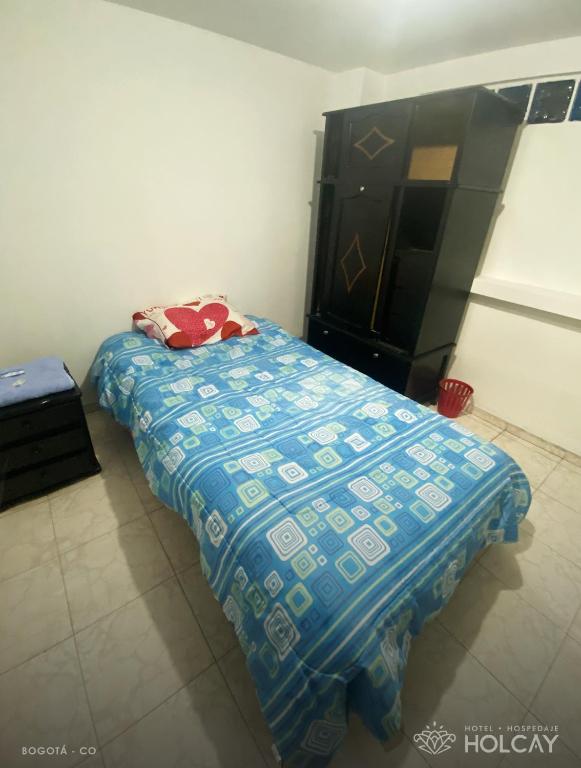 Postel nebo postele na pokoji v ubytování Hospedaje Holcay