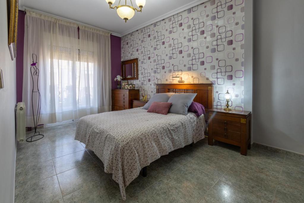 Postel nebo postele na pokoji v ubytování CASA LA TERCIA