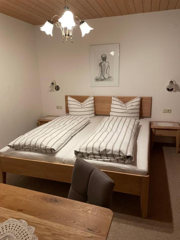 Postel nebo postele na pokoji v ubytování Haus Erler