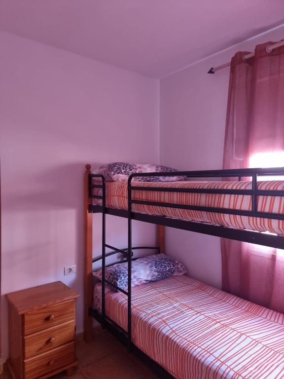 Postel nebo postele na pokoji v ubytování VV Tu Lugar en La Palma