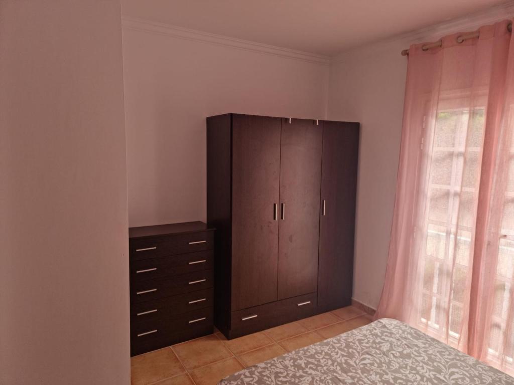 Postel nebo postele na pokoji v ubytování VV Tu Lugar en La Palma