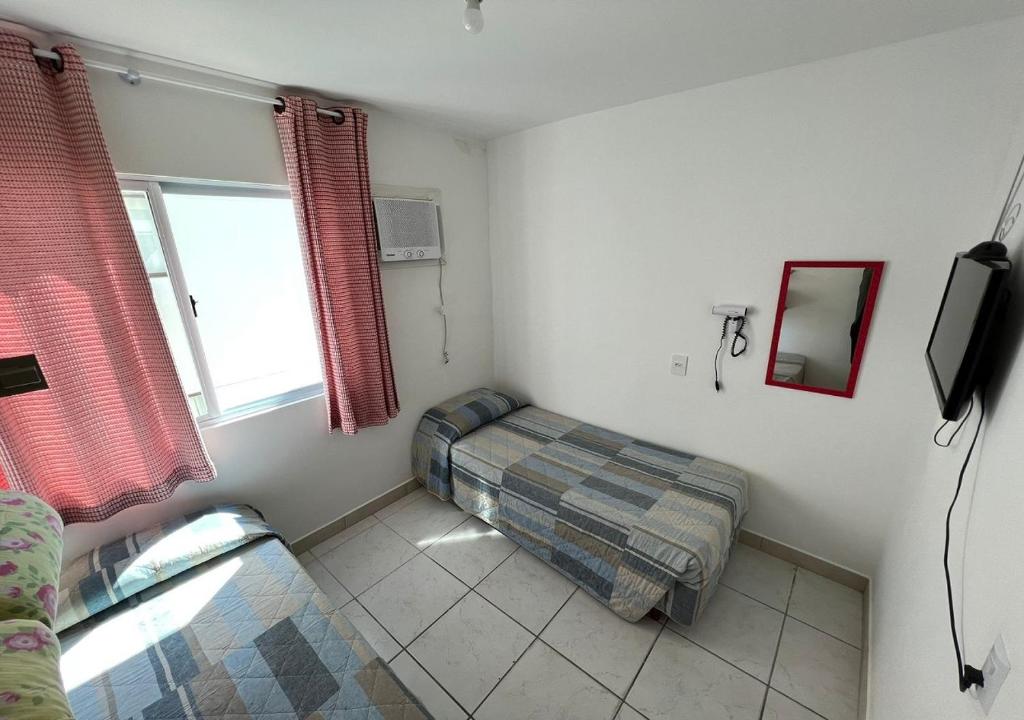 Postel nebo postele na pokoji v ubytování Pousada Louise