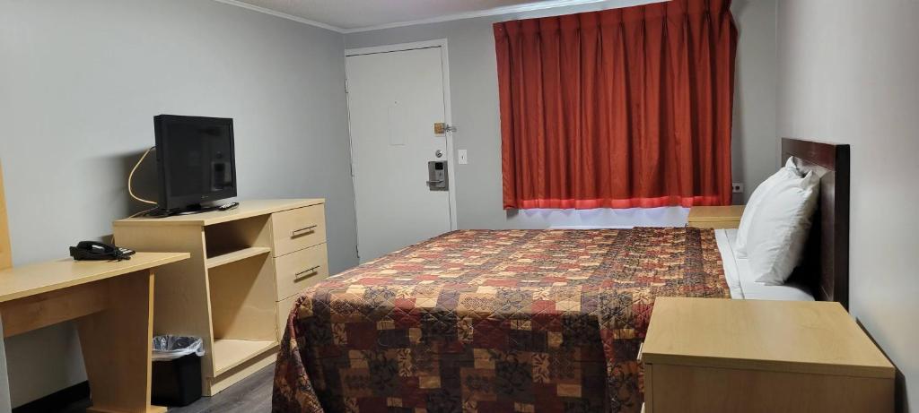 Postel nebo postele na pokoji v ubytování Superlodge