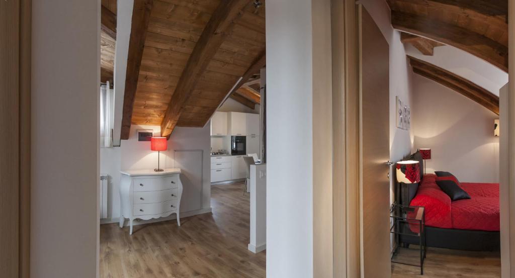 A bed or beds in a room at Residenza Tiziano
