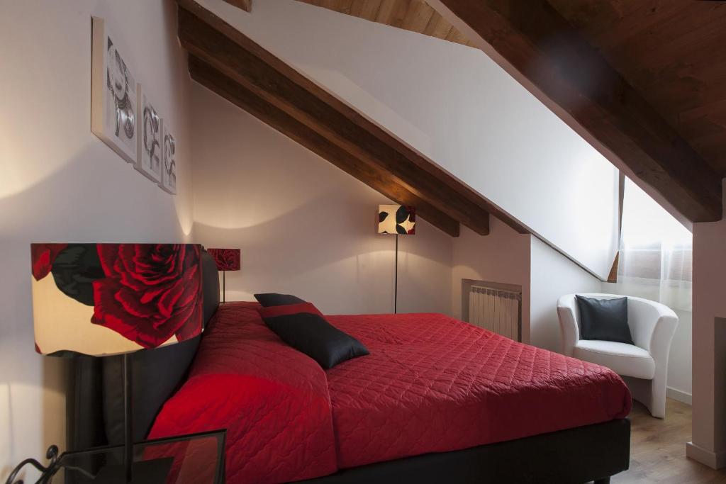 A bed or beds in a room at Residenza Tiziano