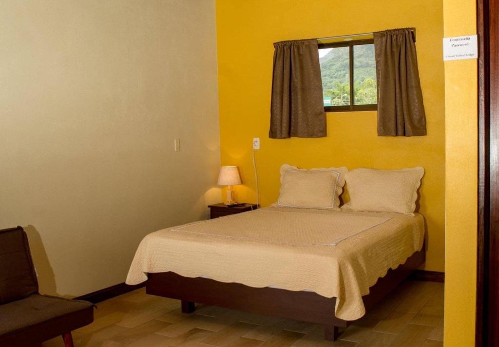 Postel nebo postele na pokoji v ubytování Villas Orosi Valley Lodge