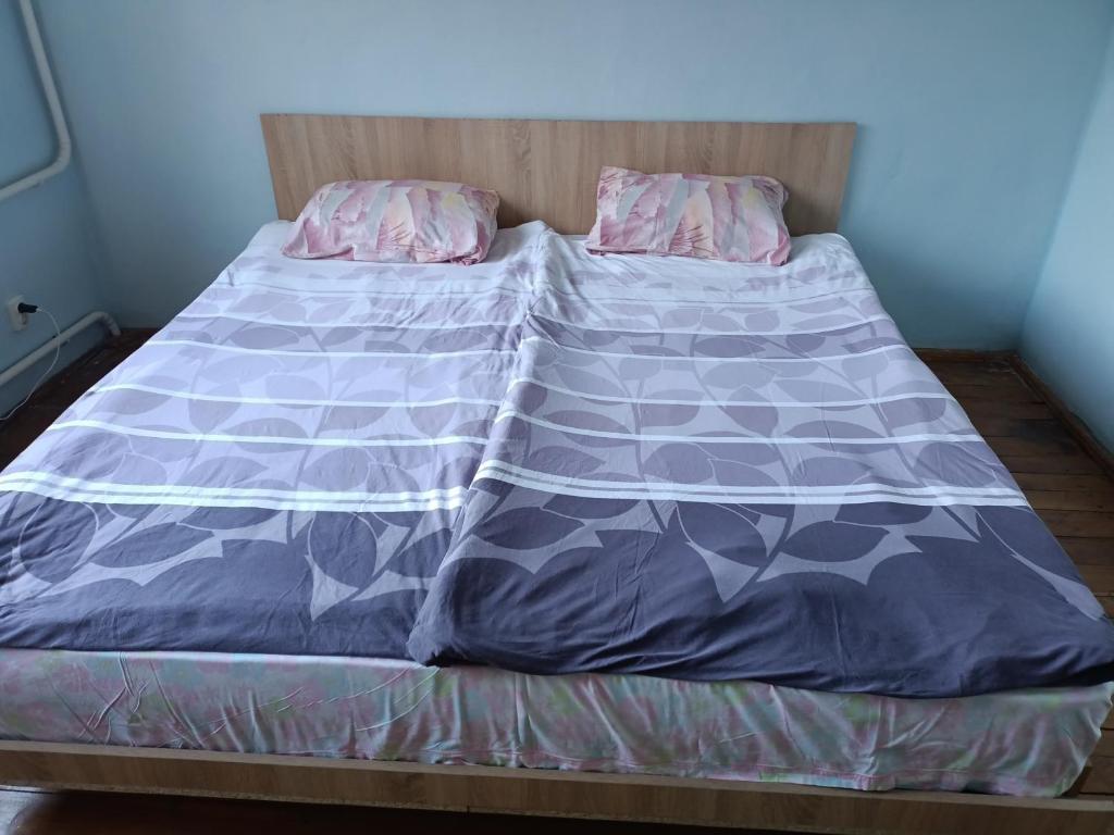 Postel nebo postele na pokoji v ubytování Krone Hostel
