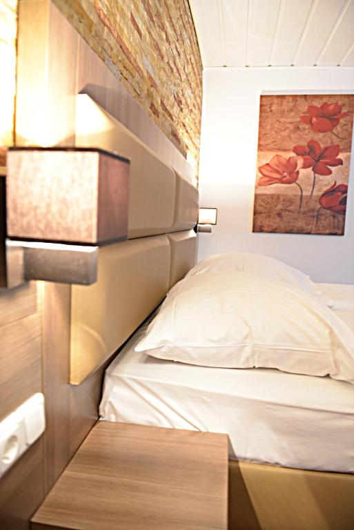 Postel nebo postele na pokoji v ubytování ITM Hotel Motel21 Hamburg-Mitte