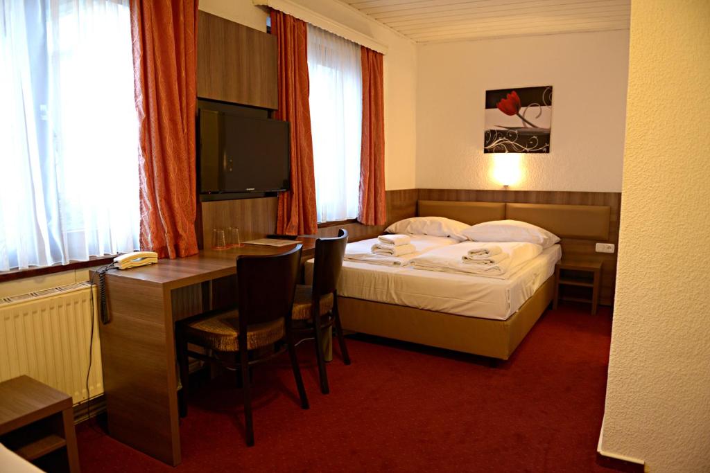 Postel nebo postele na pokoji v ubytování ITM Hotel Motel21 Hamburg-Mitte