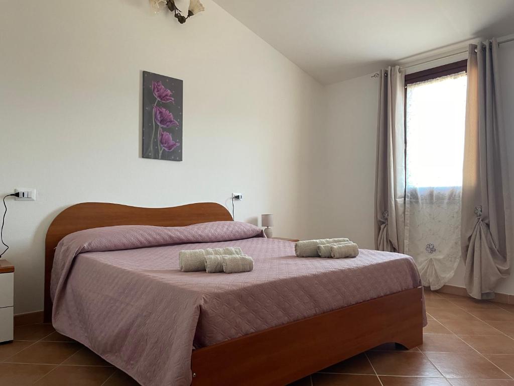 Postel nebo postele na pokoji v ubytování Villa ORCHIDEA