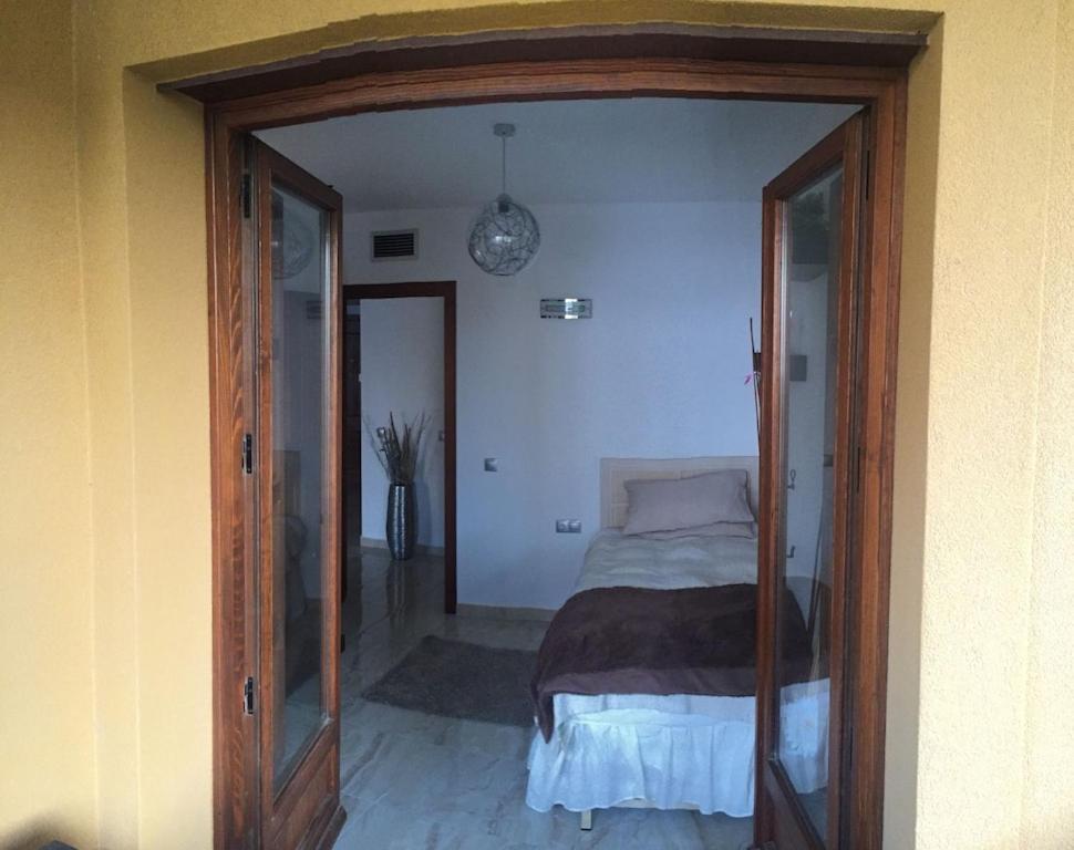 A bed or beds in a room at Panorama Park, Punta Prima, 5 star Luxury 2 bedroom Apartment like no other
