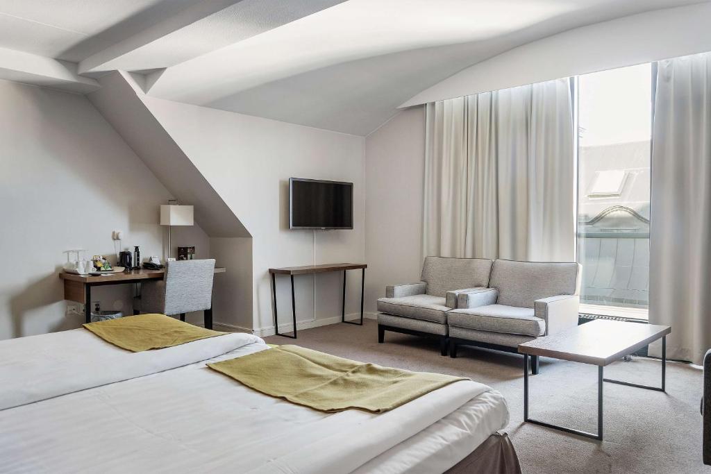 Postel nebo postele na pokoji v ubytování Best Western Plus Hotel Plaza
