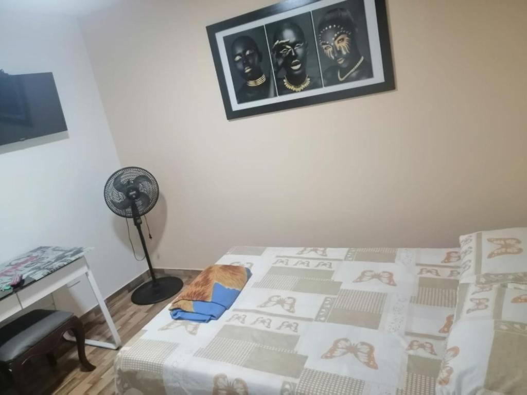 Postel nebo postele na pokoji v ubytování Hostal Avanza