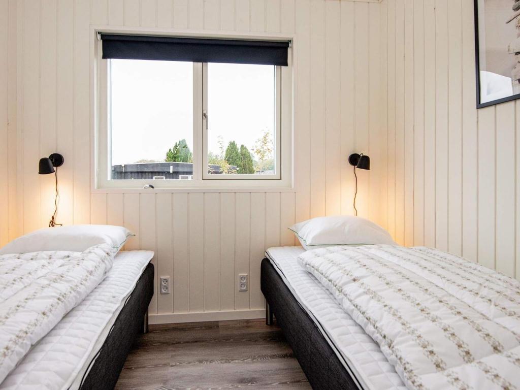 Postel nebo postele na pokoji v ubytování Luxury Seaside Retreat - By Traum Ferienwohnungen