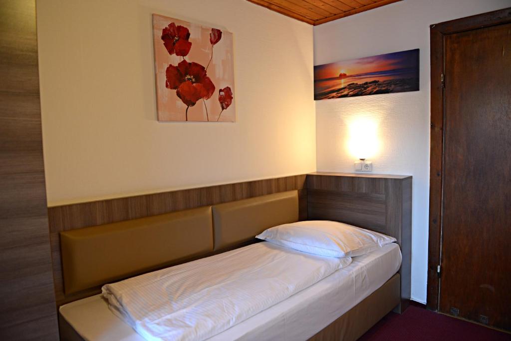 Postel nebo postele na pokoji v ubytování ITM Hotel Motel21 Hamburg-Mitte