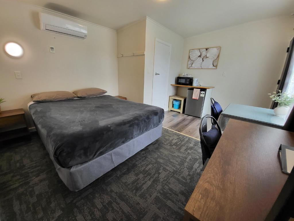 Postel nebo postele na pokoji v ubytování Rockfield Motel