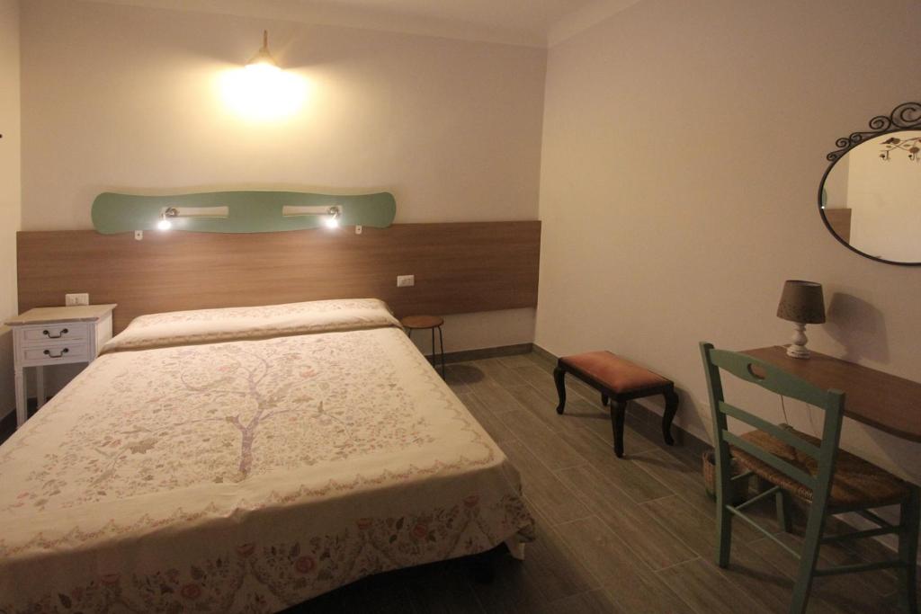 Posteľ alebo postele v izbe v ubytovaní Hotel B&B Francesca