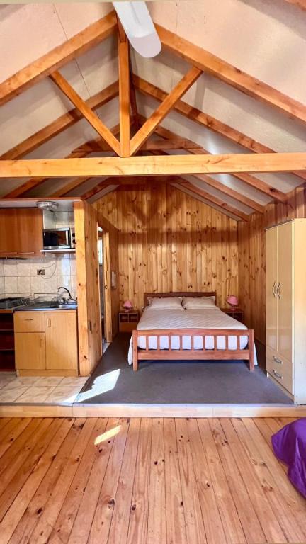Cama o camas de una habitación en Cabañas Bosque las Trancas