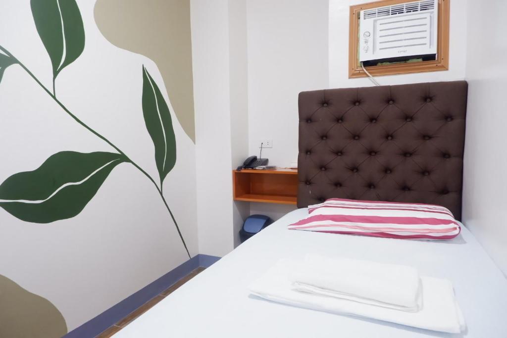 Postel nebo postele na pokoji v ubytování FB DORMITEL SUITES