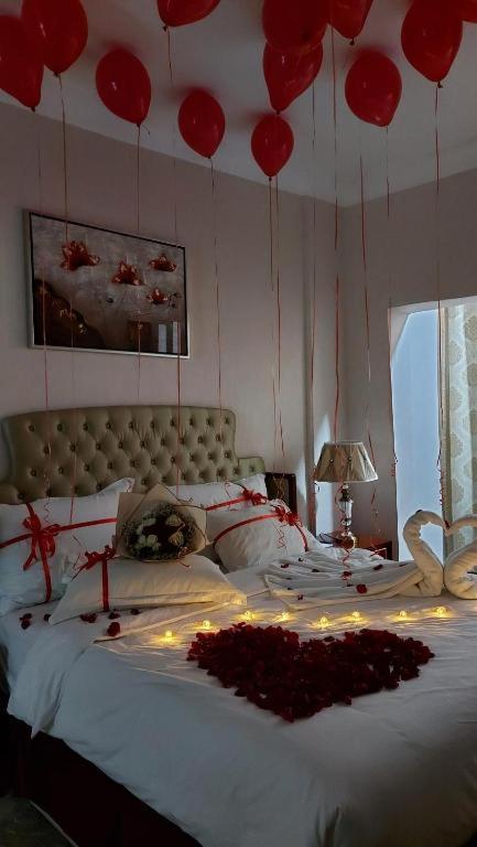 Postel nebo postele na pokoji v ubytování Al Salam Grand Hotel