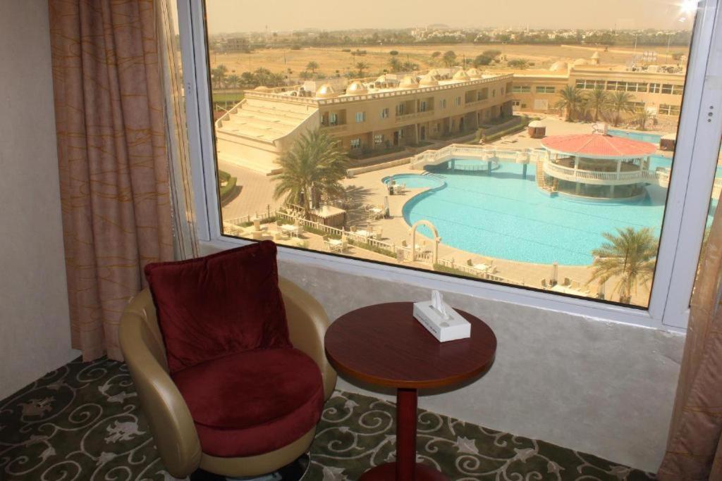 Bazén v ubytování Al Salam Grand Hotel nebo v jeho okolí