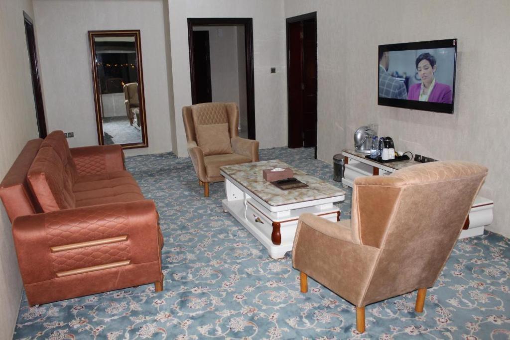 TV a/nebo společenská místnost v ubytování Al Salam Grand Hotel
