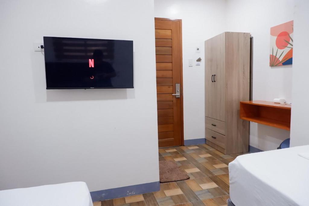 Postel nebo postele na pokoji v ubytování FB DORMITEL SUITES
