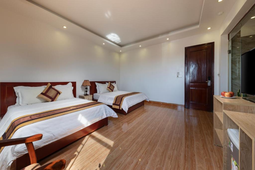 Postel nebo postele na pokoji v ubytování Airport Transit Hotel