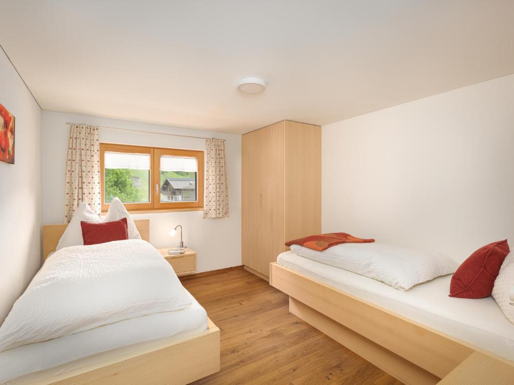 Postel nebo postele na pokoji v ubytování Felder Apartments