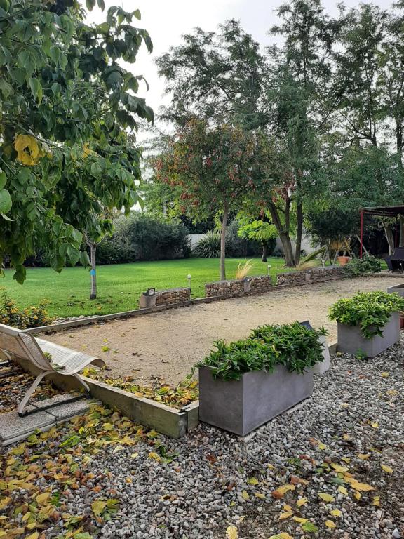 Vonkajšia záhrada v ubytovaní Tranquillité B&B