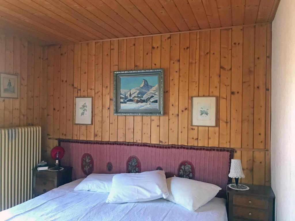 Postel nebo postele na pokoji v ubytování Les Tchaipus