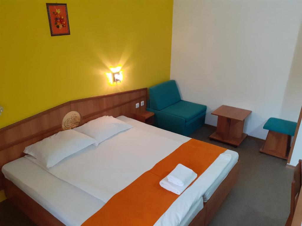 Postel nebo postele na pokoji v ubytování Hotel Les