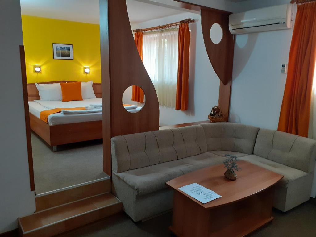 Postel nebo postele na pokoji v ubytování Hotel Les