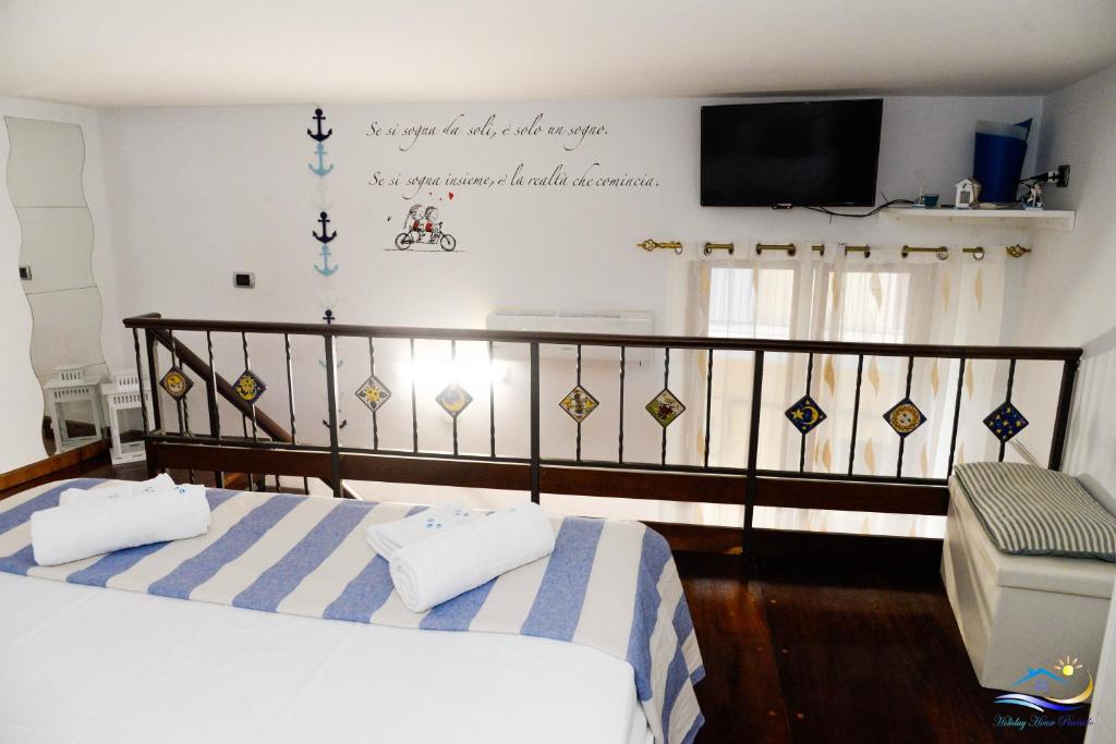 Posteľ alebo postele v izbe v ubytovaní Holiday House Piccirillo