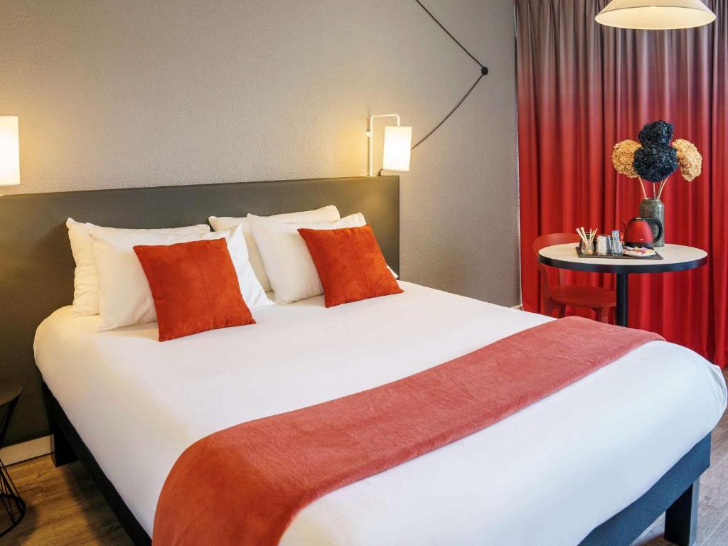 Postel nebo postele na pokoji v ubytování Ibis Alès Centre Ville