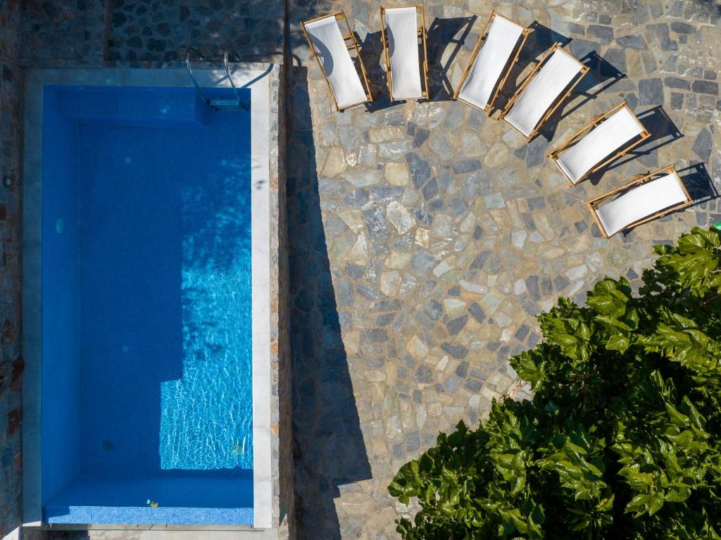 The swimming pool at or close to Evia Silence