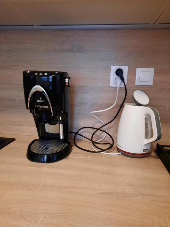 Coffee and tea making facilities at Apartment Klimka with balcony, free wifi and free parking