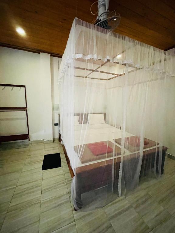 Postel nebo postele na pokoji v ubytování Jade Green Rest Inn