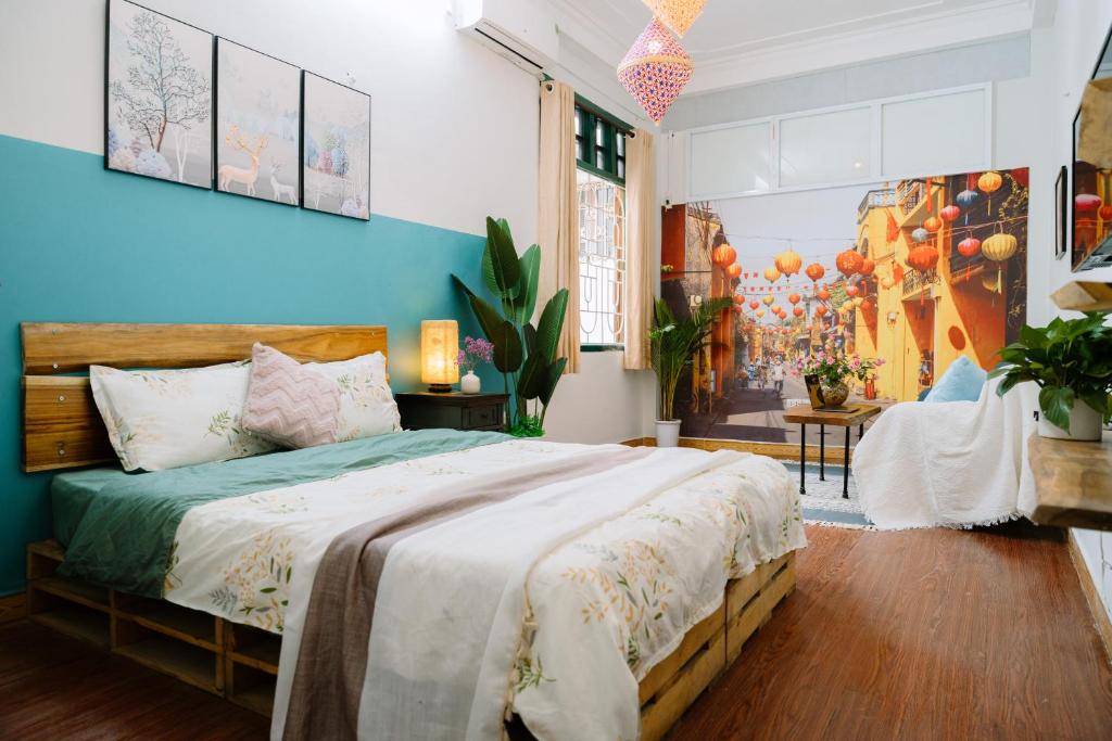 Postel nebo postele na pokoji v ubytování Hanoi Hola House