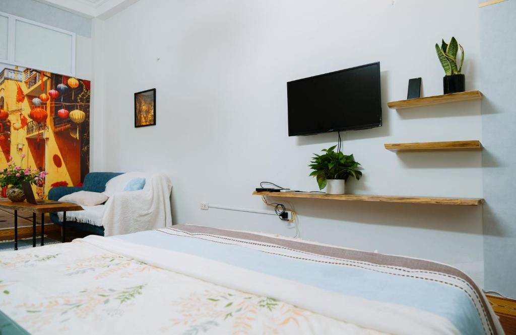 TV a/nebo společenská místnost v ubytování Hanoi Hola House