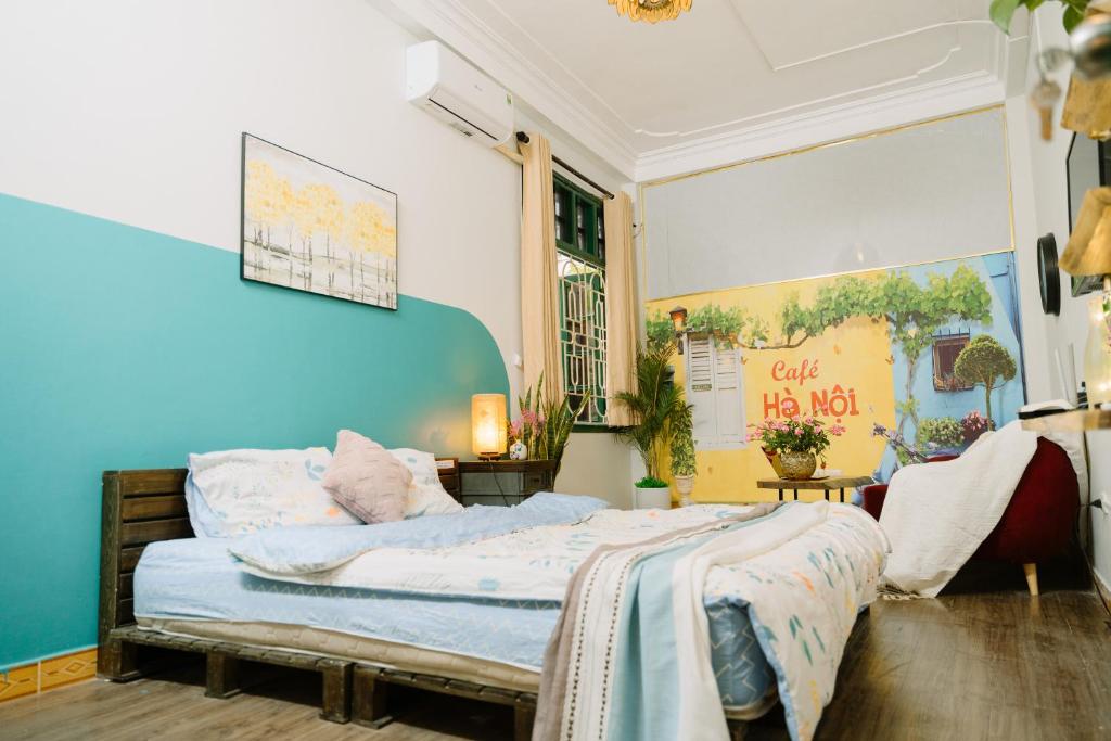 Postel nebo postele na pokoji v ubytování Hanoi Hola House