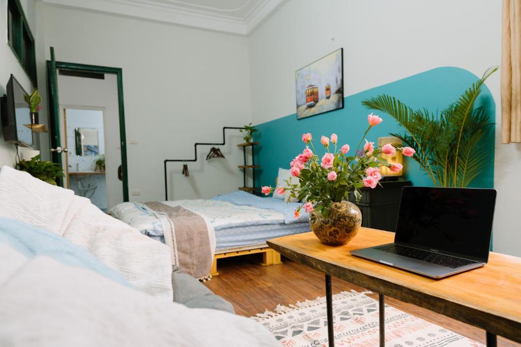 Postel nebo postele na pokoji v ubytování Hanoi Hola House