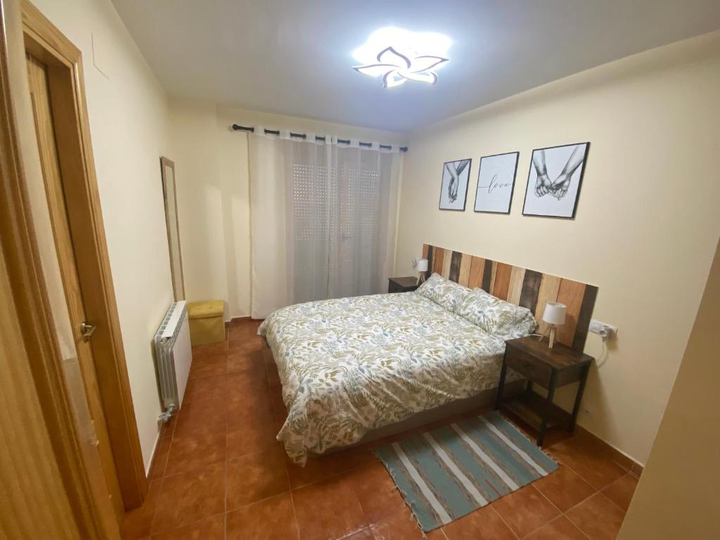 Postel nebo postele na pokoji v ubytování Casa La Fontana Bronchales