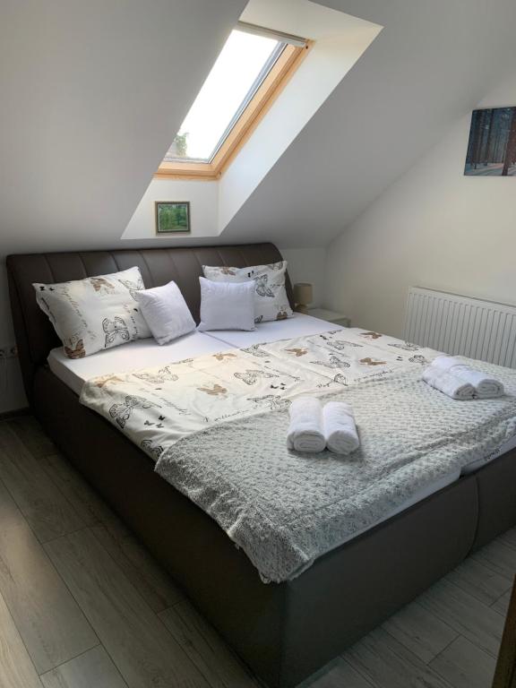 Posteľ alebo postele v izbe v ubytovaní Fodan Apartman