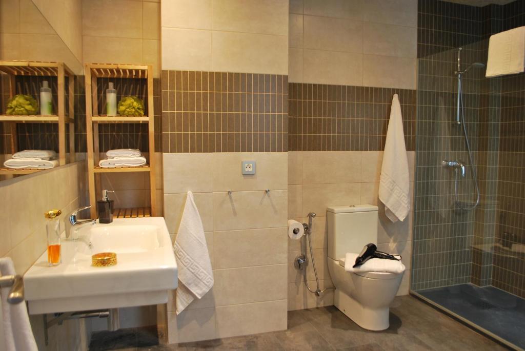 Łazienka w obiekcie Sevilla Central Suites Apartamentos Puerta Jerez