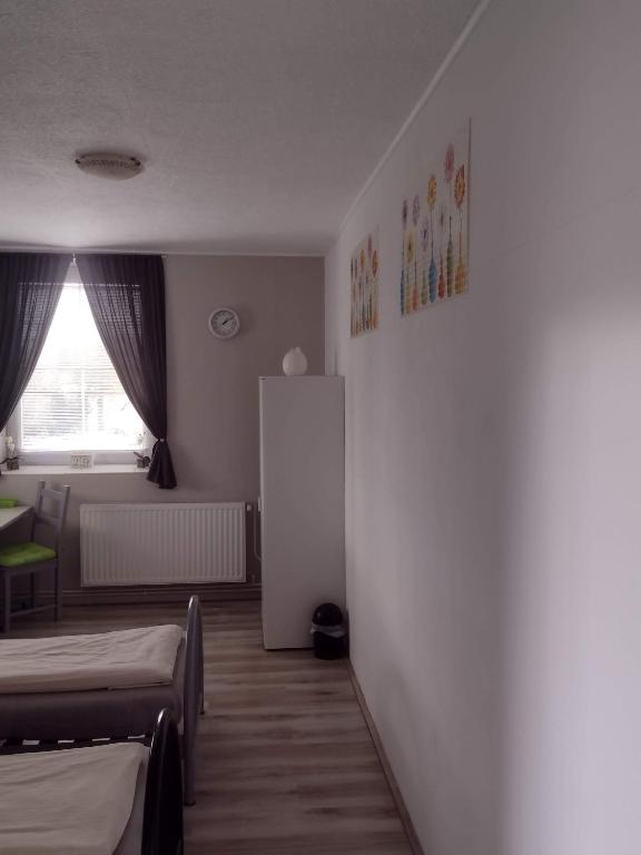 Postel nebo postele na pokoji v ubytování Pension Novy Den