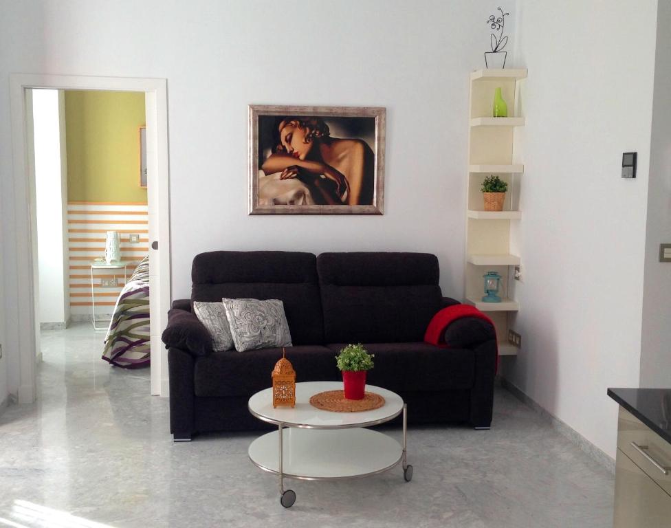Część wypoczynkowa w obiekcie Sevilla Central Suites Apartamentos Puerta Jerez